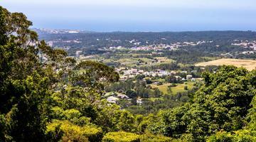 Photo by Wendell Adriel on Unsplash The image displays an aerial view on Lisbon Metropolitan Area, with towns, fields, forest and the sea in the background.