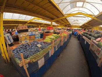 Market in Brasov municipality The image shows an indoor market hall located in the municipality of Brasov